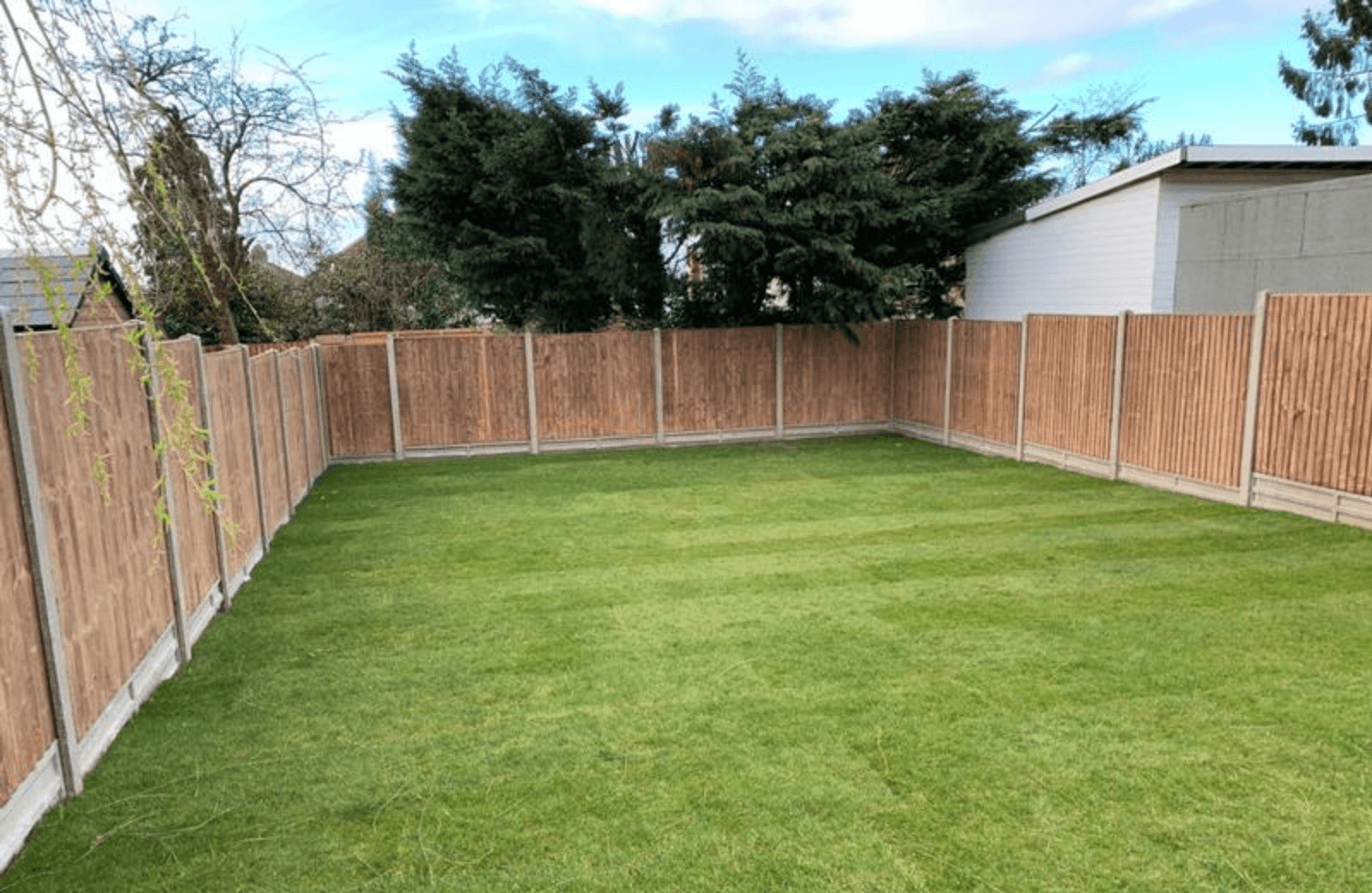 New Panel Fencing with turf